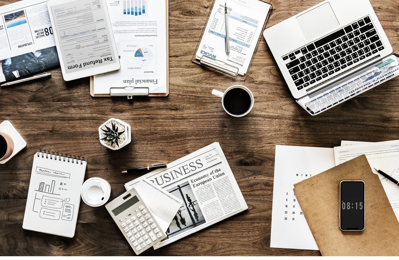 Reviewing quarterly tax documents at a desk