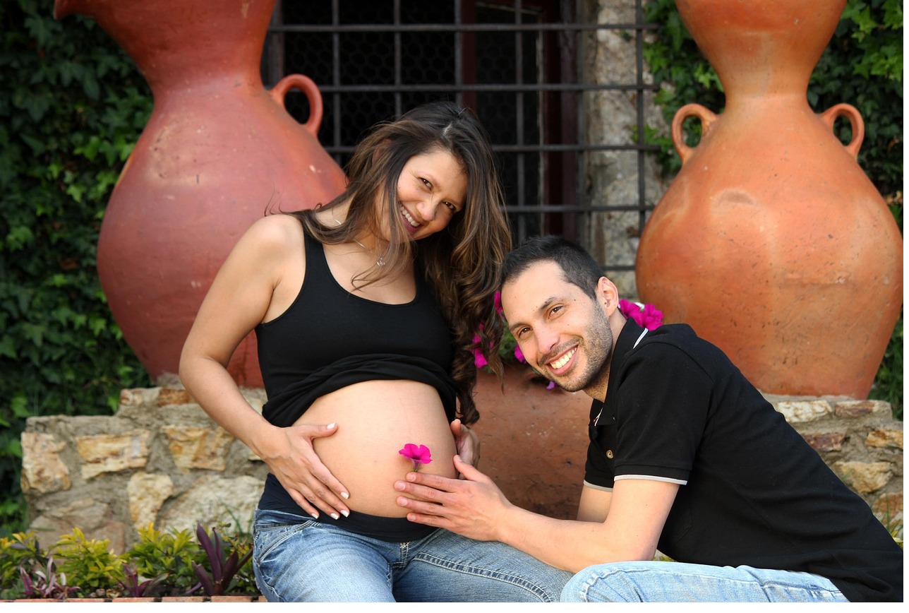 A couple expecting a child, one of life's transitions we plan for